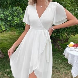 White dress perfect for bridal shower or beach pictures